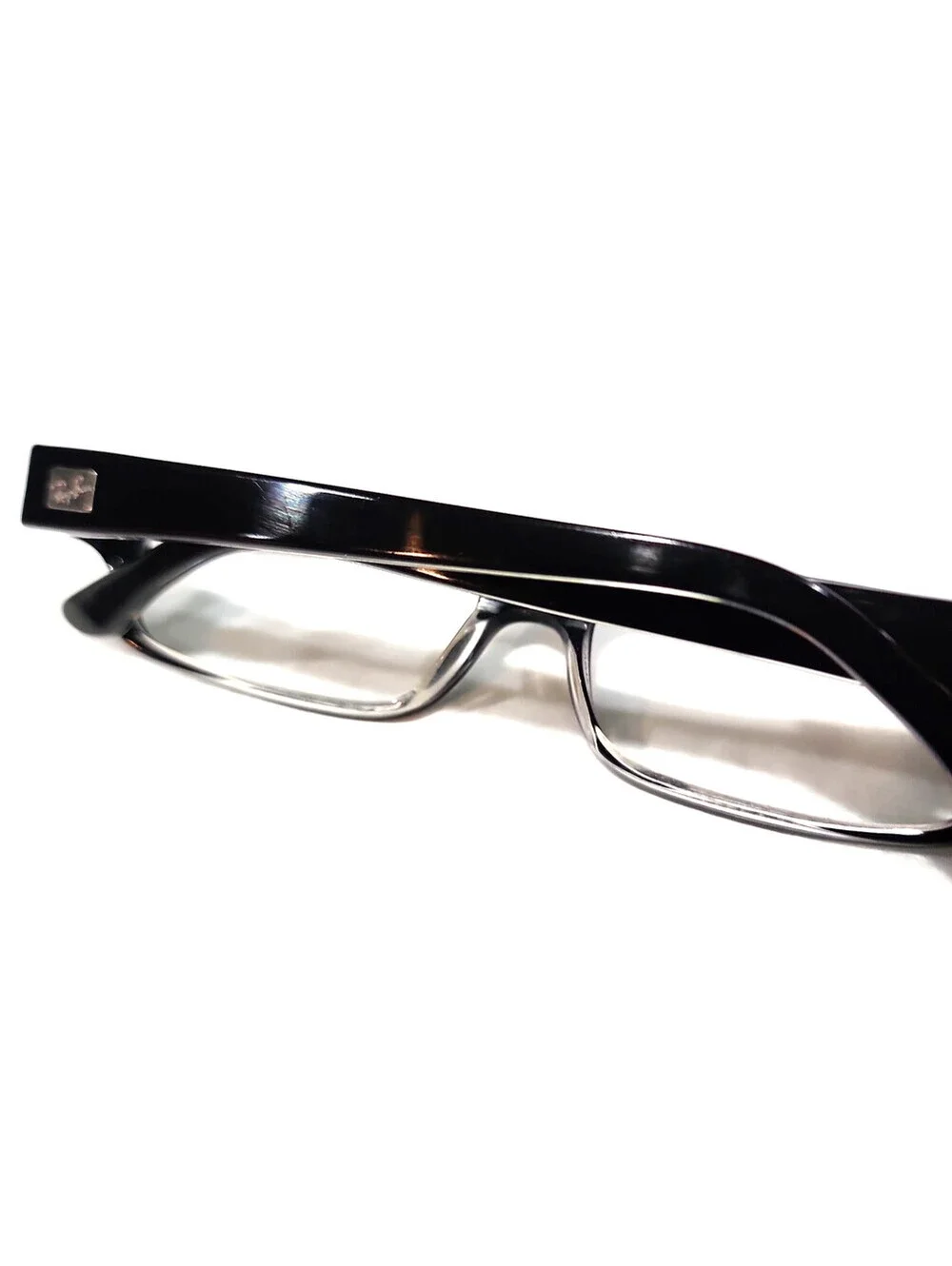Ray-Ban arms few